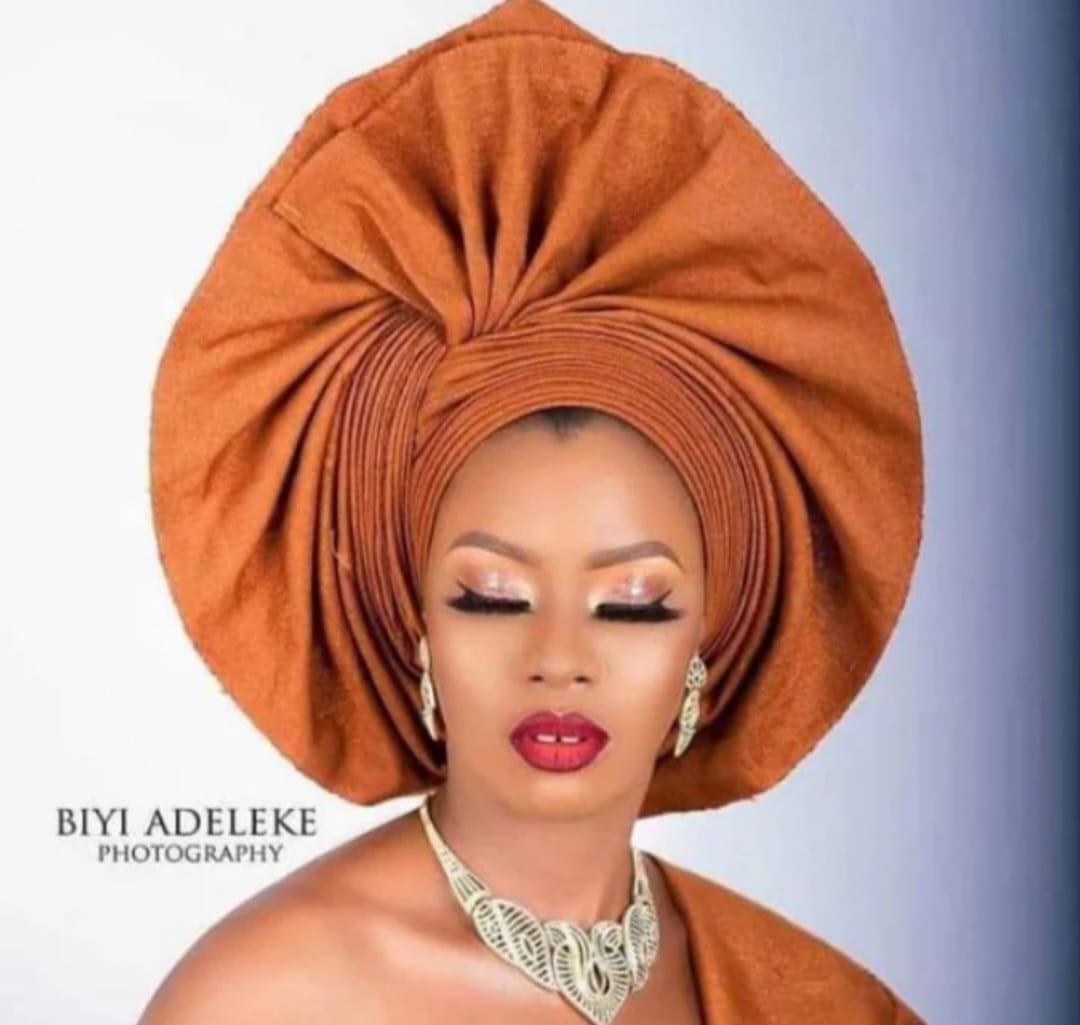 Queen Ayoka Aso-Oke Set in Burnt Orange.